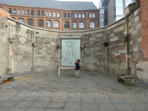 Observing art at St. Nikolai in Hamburg, Germany, where a memorial has been created for victims of World War II. Photo credit: M. Ciavardini